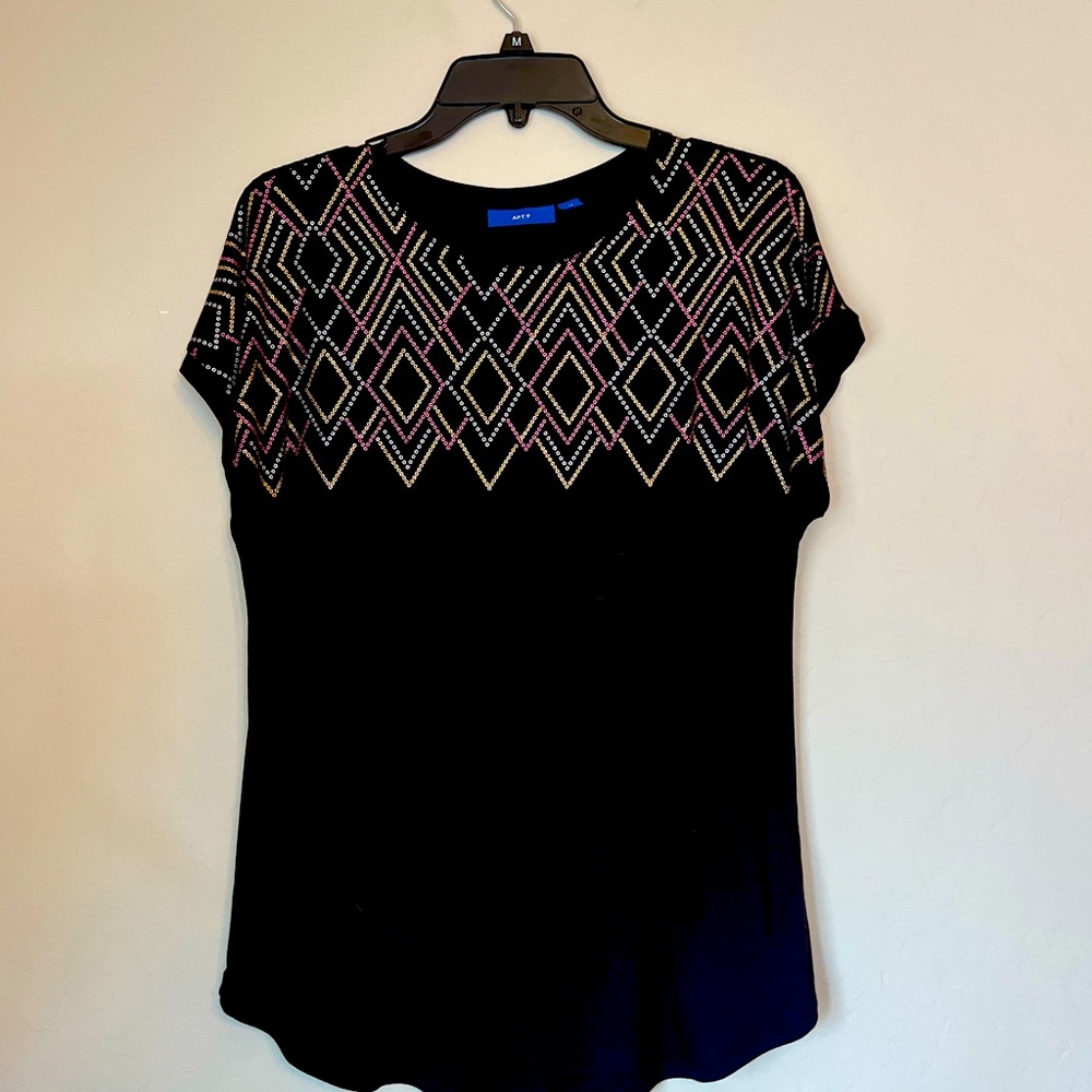 Sleeveless metallic embellished top. Never worn.